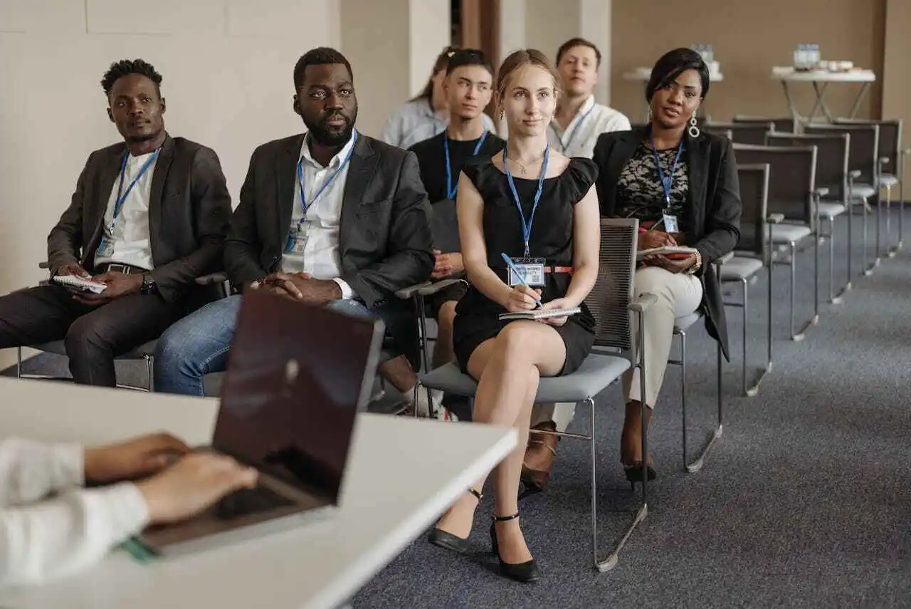 Employees sitting in a meeting